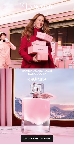 Julia Roberts hält mehrere rosa Geschenkboxen mit dem Lancôme-Logo. Unten ist eine Nahaufnahme des rosa Parfümflakons La Vie Est Belle Vanille Nude, der vor einem Fenster mit malerischem Blick auf verschneite Berge platziert ist.